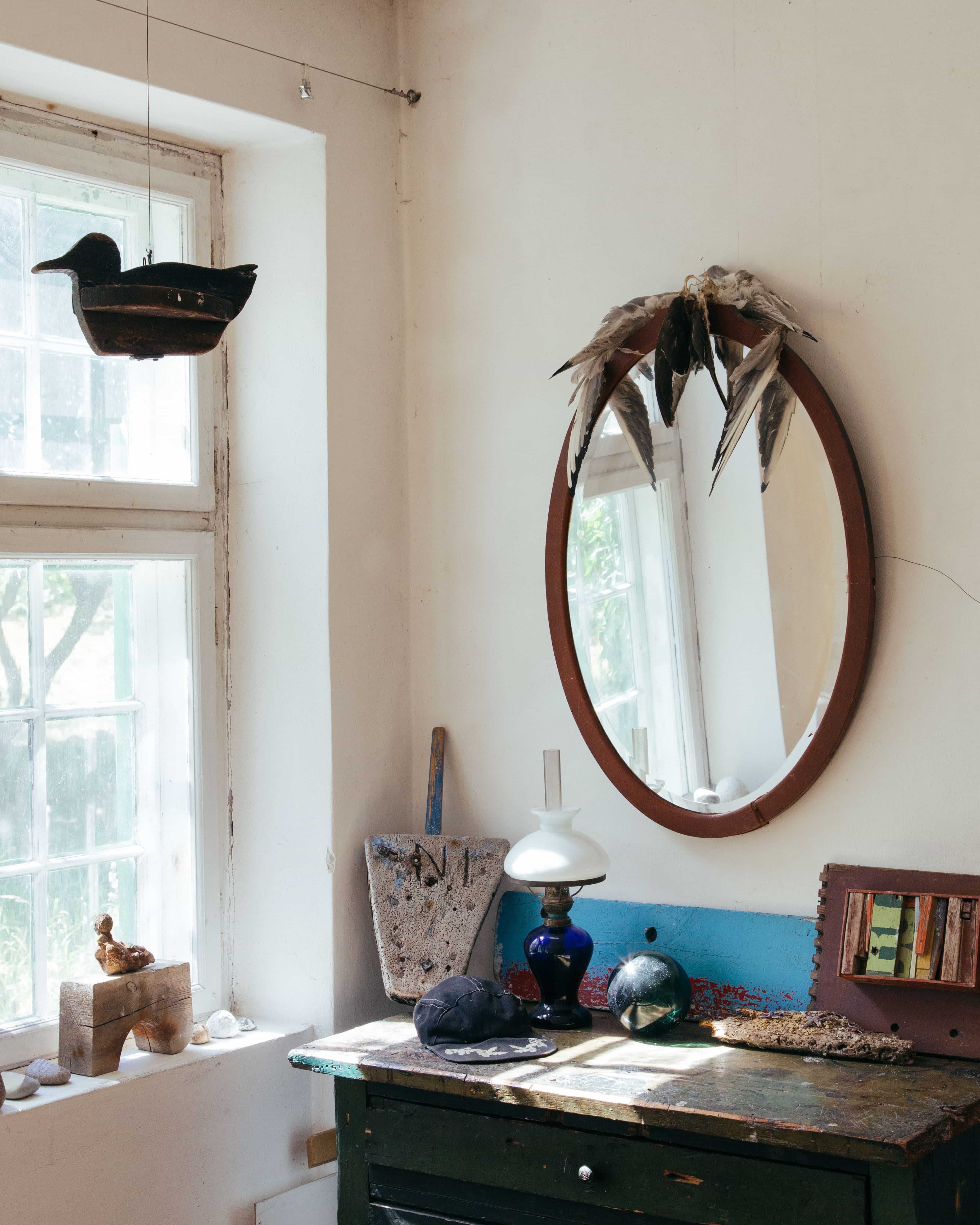 Three men in front of Fyrgaarden.